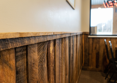 Close up shot of the rustic wood walls and trim inside Jill's Cafe